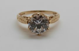 A 9ct gold ring set with cubic zirconia, 2.