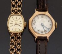 Two 9ct gold ladies wristwatches comprising a Record wristwatch on brown leather strap and a Tissot