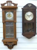 Two c1910 wall clocks one being a two train example with reeded and columned case,