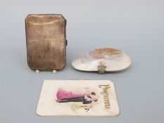 A hallmarked silver cigarette case with engine turned decoration, length 8.