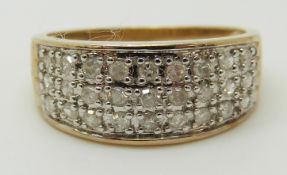 A 9ct gold ring set with diamonds in three rows, total diamond weight approximately 0.5ct, 2.