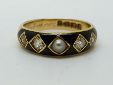 An 18ct gold mourning ring set with three pearls and two old cut diamonds in square settings on a