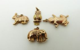 Four 9ct gold charms, elephant, frog, rabbit and owl, 4.