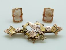 A 9ct brooch set with bird and foliate design Birmingham 1901 and a pair of 9ct gold and cameo