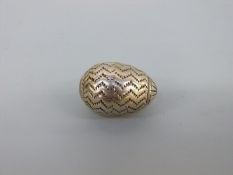 An early 18thC white metal pomander or spice holder of ovoid form with two screw sections and zig