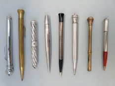 Four white metal pencils including life long marked sterling silver,