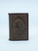 An early Bakelite celluloid Victoria In Memoriam vesta.