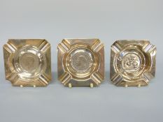 A pair of 1935 rocking horse crown based hallmarked silver ashtrays,