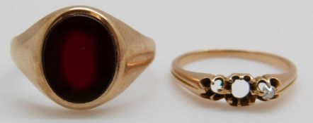 A 9ct gold signet ring set with agate and a yellow metal ring, 6.