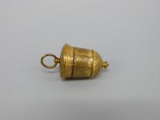 A 17thC hinged gilt metal spice holder or vinaigrette with suspension loop, drop finial,