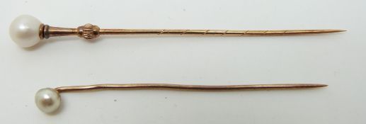 Two Victorian stick pins set with a pearl to each