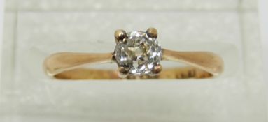 An 18ct gold ring set with an old cut diamond measuring approximately 0.25ct, 1.