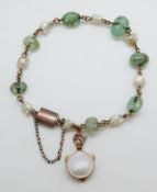 A 19thC bracelet set with pearls and emeralds in Mappin & Webb box
