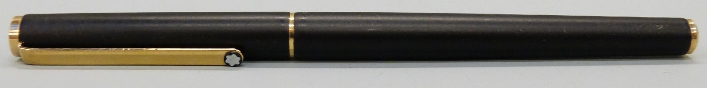 Montblanc slimline fountain pen with matte black resin barrel and cap, gold plated fittings,
