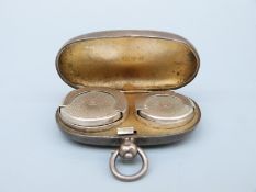 An Edward VII hallmarked silver sovereign case with holder for half and full sovereigns,