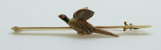 A Victorian tie pin/ brooch set in the form of a pheasant set with enamel, 5.