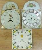 Two painted Roman dial longcase clock dials with floral decoration and Roman numerals,