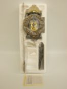 A seven day skeleton lantern style wall clock with single weight driven movement and pendulum,