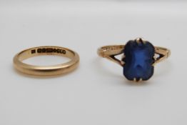 A 9ct gold wedding band and a 9ct gold ring