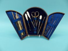 A leather cased crochet set, costume jewellery, hallmarked silver mounted wallet, vintage