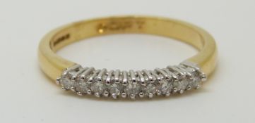 An 18ct gold ring set with diamonds, total diamond weight approximately 0.2ct, 2.