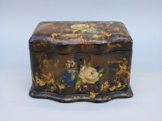 A 19thC lacquer two-division tea caddy with flower and bird decoration, probably by Betteridge,