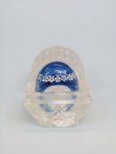 An engraved French blue glass ring in a glass case