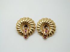 A pair of 14k gold earrings set with diamonds and rubies to each, 11.2g, 2.