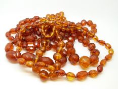Four translucent amber necklaces, three with faceted beads, 183g.