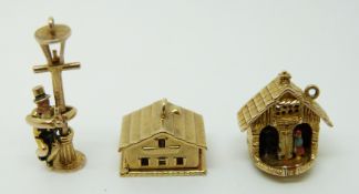 A 9ct gold charm in the form of a house,
