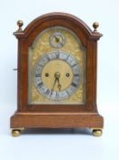 An oak-cased twin fusee mantel clock with movement stamped 558,