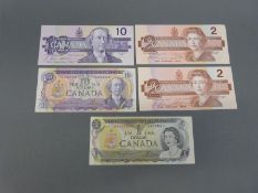 A 1971 Canada 10 dollar bank note replacement Lawson/ Bokey, AU, together with a 1989 example,