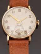 Cyma 9ct gold gentleman's wristwatch with subsidiary seconds dial, Arabic numerals and gold hands,
