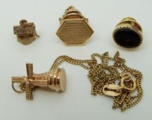 A 9ct gold necklace, 9ct gold tie pin and a 9ct gold charm (5.