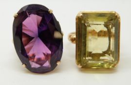 A 14ct gold ring set with a purple sapphire and an 18ct gold ring set with a large citrine