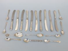 Four various hallmarked silver spoons, weight 31g, a quantity of white metal and other spoons,