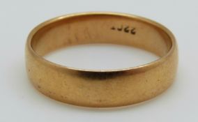 A 22ct gold wedding band, 5.