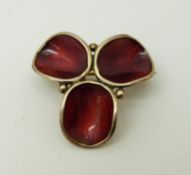 A silver brooch set with red enamel marked 925 Norway,