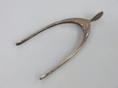 A pair of George V mostly hallmarked silver wishbone sugar tongs,