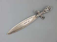 An Edward VII hallmarked silver bookmark in the form of an ornate sword, Birmingham 1903,