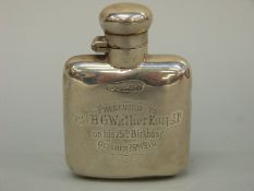 An Edward VII small hallmarked silver hip flask with bayonet cap, Birmingham 1909,