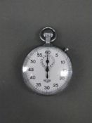 Heuer chrome plated keyless winding stopwatch with black Arabic numerals and white face,