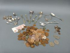 A quantity of largely UK coins and silver plate