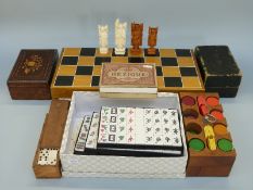 A collection of vintage games including cased Rubicon Bezique with two ivory mounted counters,