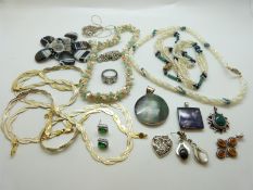 A collection of silver jewellery to include necklaces, bracelet, pendants, agate necklace,