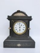 A slate mantel clock with marbled inlaid decoration, PFB to Roman enamelled dial,