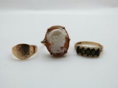 A 9ct rose gold ring set with a shell cameo, a yellow metal signet ring and a 9ct gold ring, 6.