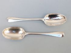 A pair of Victorian hallmarked silver rat tail spoons,