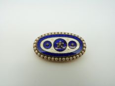 An early Victorian oval brooch,