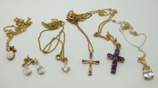 Two 9ct gold crosses with amethysts, four 9ct gold chains, a 9ct gold pendant set with an opal,